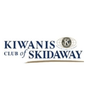 Logo of the kiwanis club of skidaway, featuring blue text and a gold emblem above a curved line.